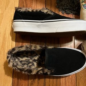 black platform vans with cheetah fur line. Size 7 worn a handful of time
